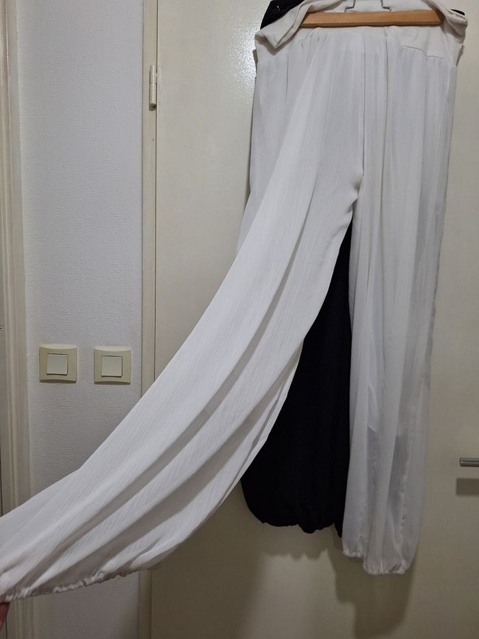 Veste simili couleur saumon T 48 . 10 € . Chemisier effet léopard 5€ .  Tunique léopard     T 48 ,5€ . Ensemble  robe    voile et surchemise  ( neuf  jamais porté  )  couleur saumon   T 48/50   robe doublée 10 €  l' ensemble .  Pantalon voile  n - photo numéro 6