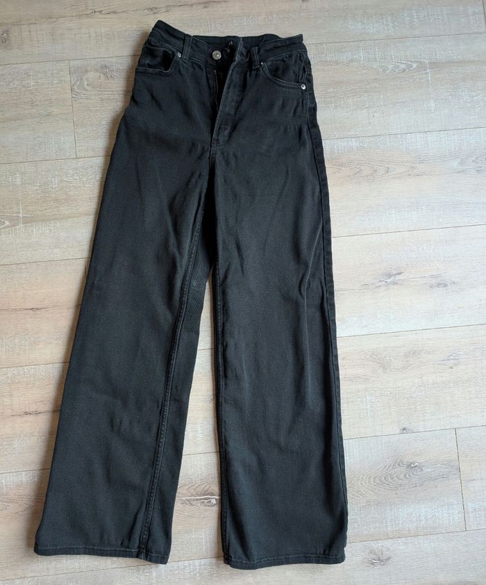 Jean noir jambes larges