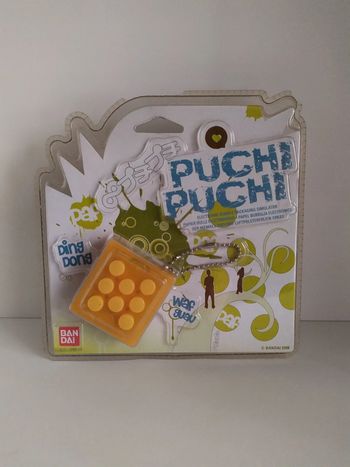 Porte-clés électronique Puchi Puchi jaune Bandai 2008 neuf