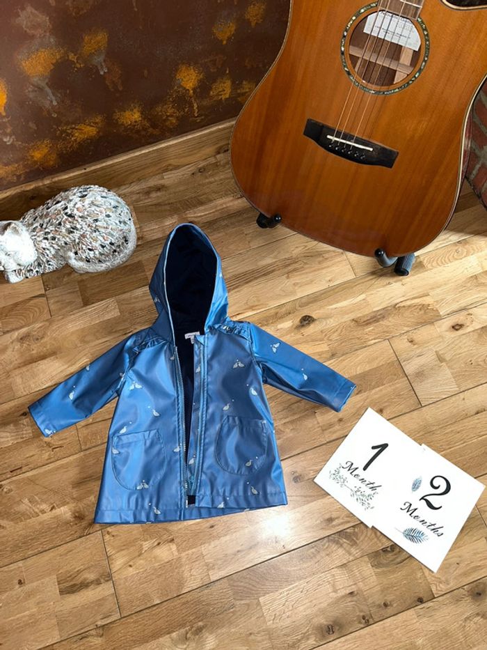 Bel impermeable bleu motifs oiseaux doublé coton absorba très bon état 12mois/74cm