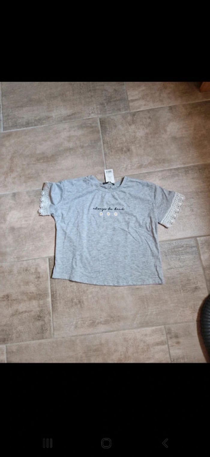 Tee shirt Georges neuf 9/10 ans