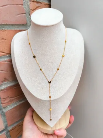 Pendentif doré en Y avec papillons