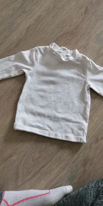Pull fin col roulé