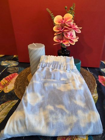 Jeans bleu ciel nuages S