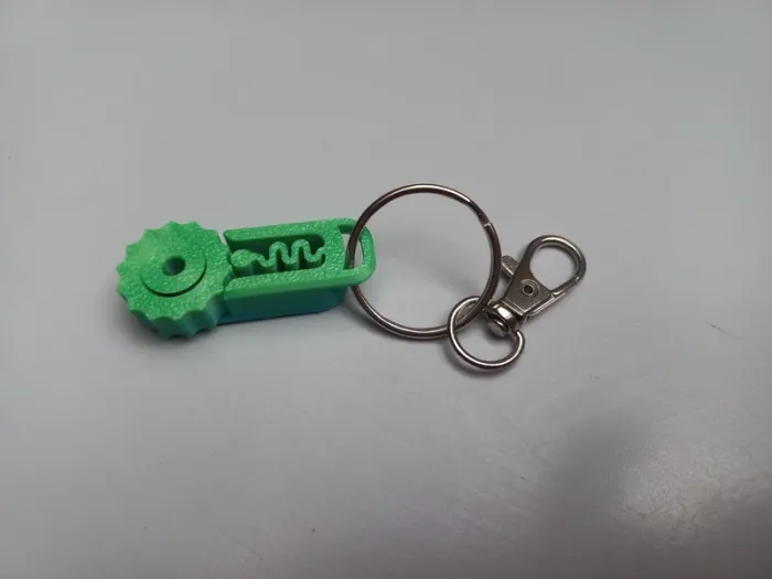 Porte clés neuf engrenages
