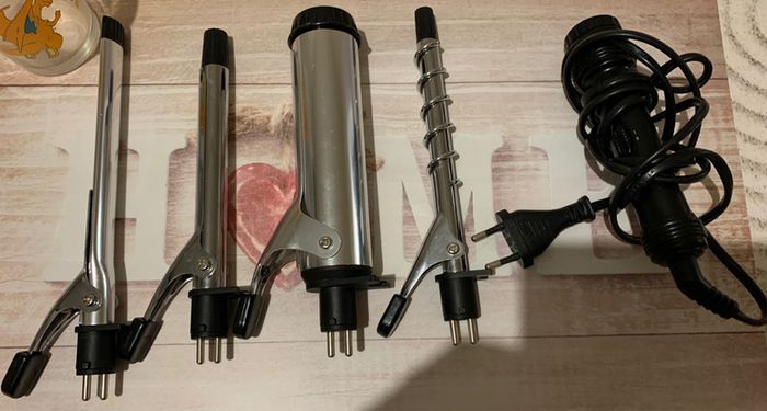 Fer à lisser, boucler et friser