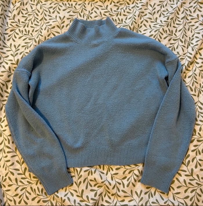 Pull col roulé