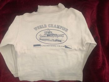 Col roulé beige CFK 6 ans