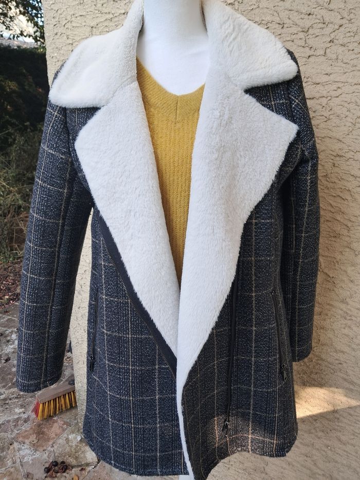 Manteau chaud moumoute