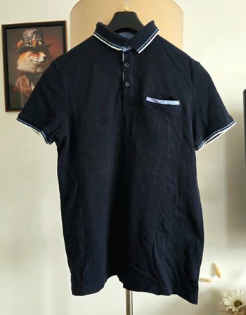 Polo bleu marine très bon état 