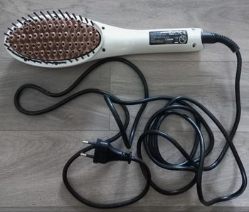 Brosse chauffante à lisser