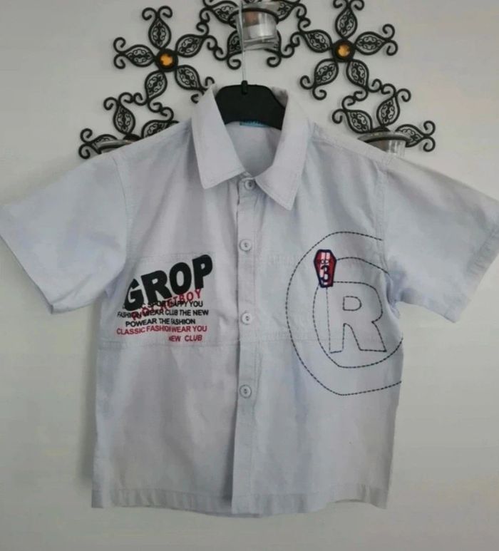 Jolie chemise bleue ciel 6 ans