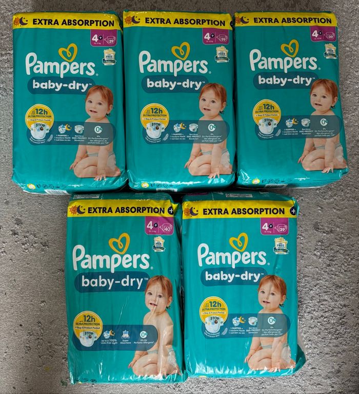 5 paquets de couches Pampers taille 4+