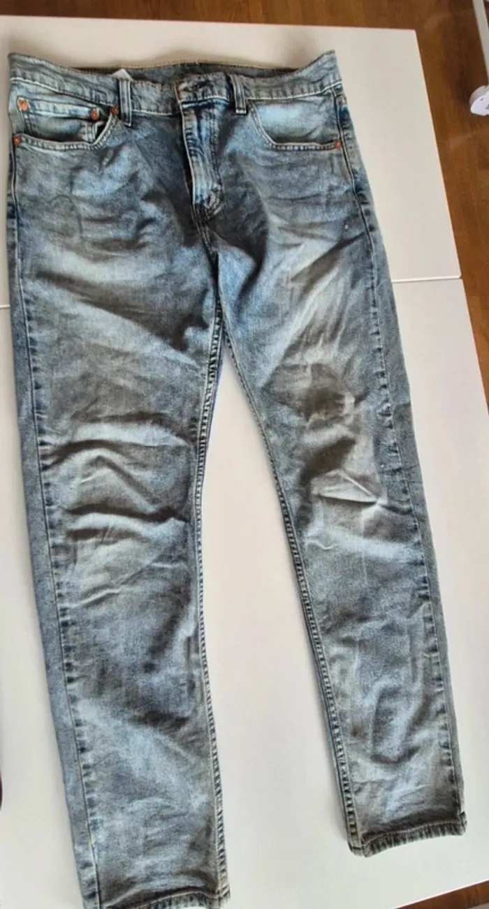 Jean Slim Taper 512 Bleu
33 (US) = 42 - 44 (FR) - L 32 - photo numéro 16
