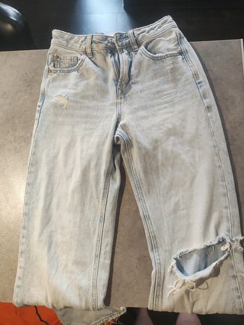 Jean à trous Stradivarius pattes d'éléphant bleu clair taille 32