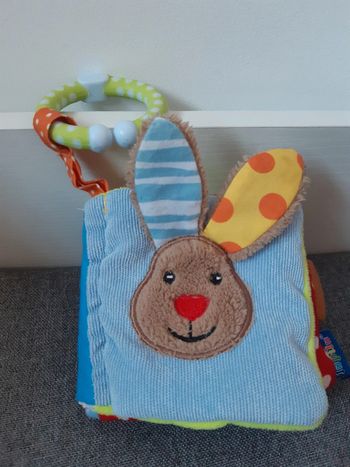 Petit livre 📖 d'éveil en tissu Lupilu