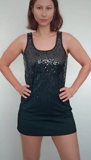 Haut long noir a sequins chic taille 38