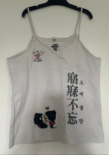 Tee shirt à bretelles Pucca taille 18 ans (168 cm)