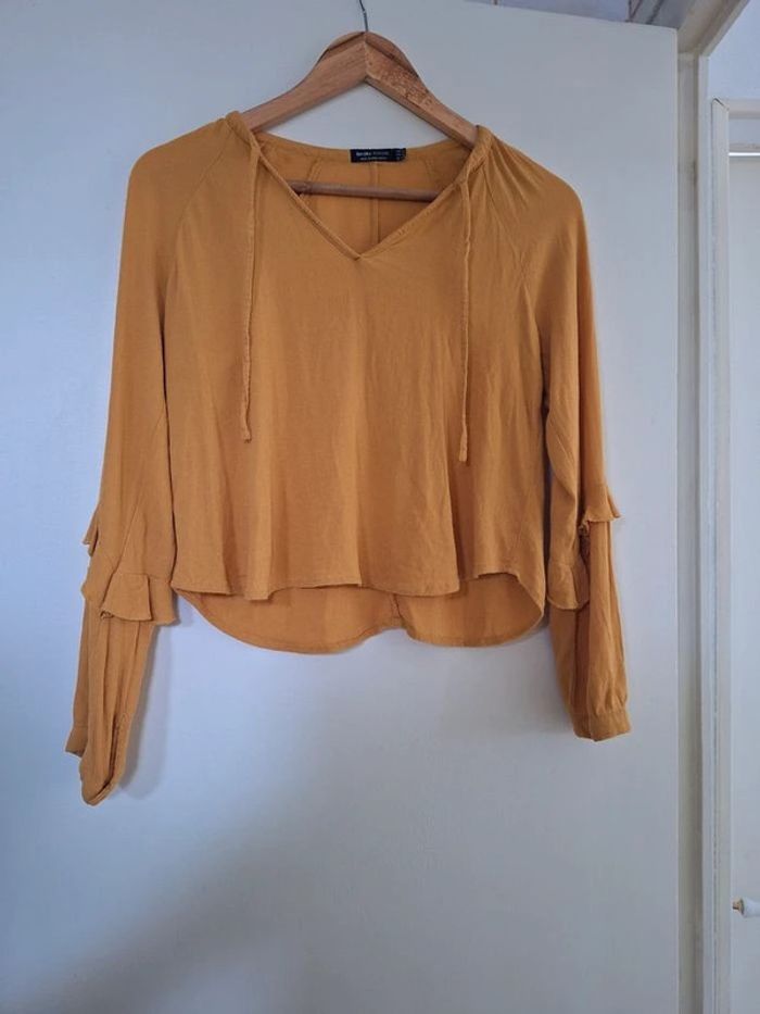 Petit haut taille S coloris moutarde