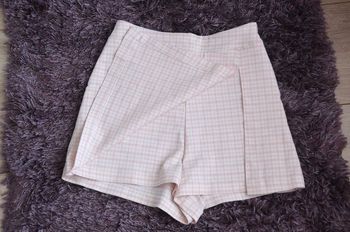 Jupe short taille 14 ans comme neuf 