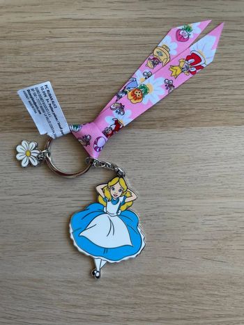 Porte-clés Disney Alice au Pays des Merveilles - Ruban Fleuri - Disneyland Paris