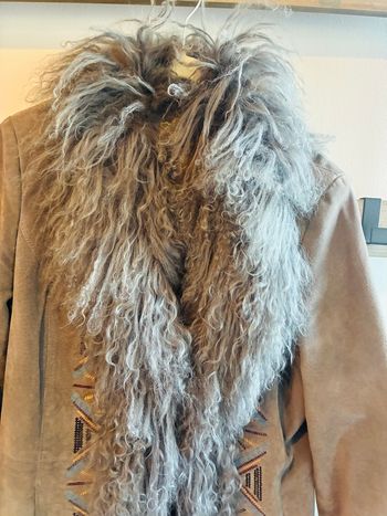 Superbe manteau fausse fourrure