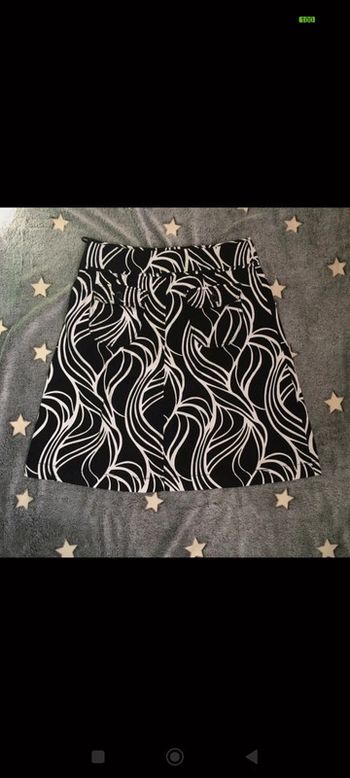 Jupe trapèze noire et blanche h&m t38 motif feuilles