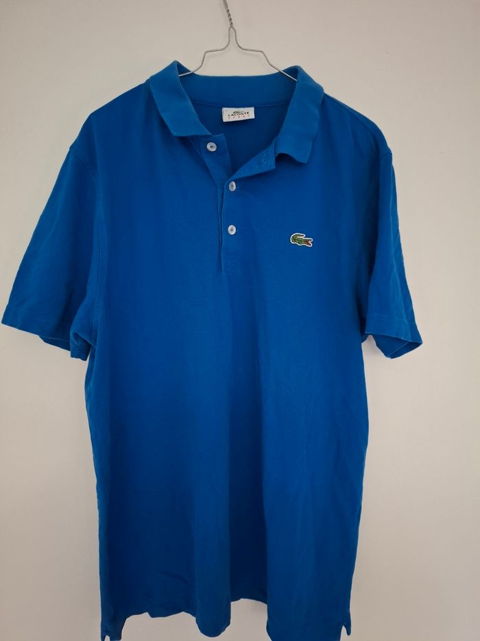 Polo lacoste bleu taille 5 (L)