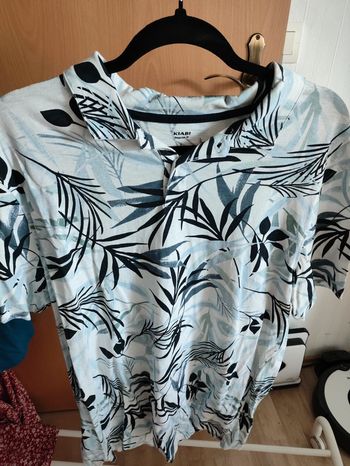 Polo fleuri taille L Kiabi