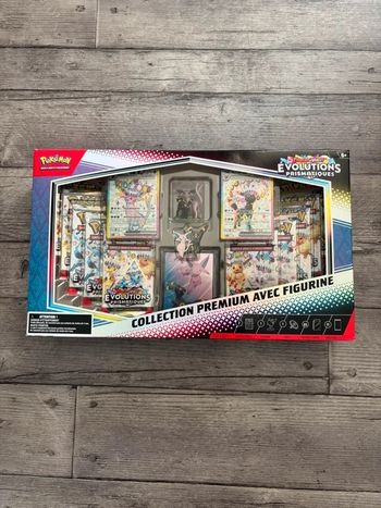 Coffret collection prenium avec figurine Évolutions Prismatiques neuf et scellé en français. 