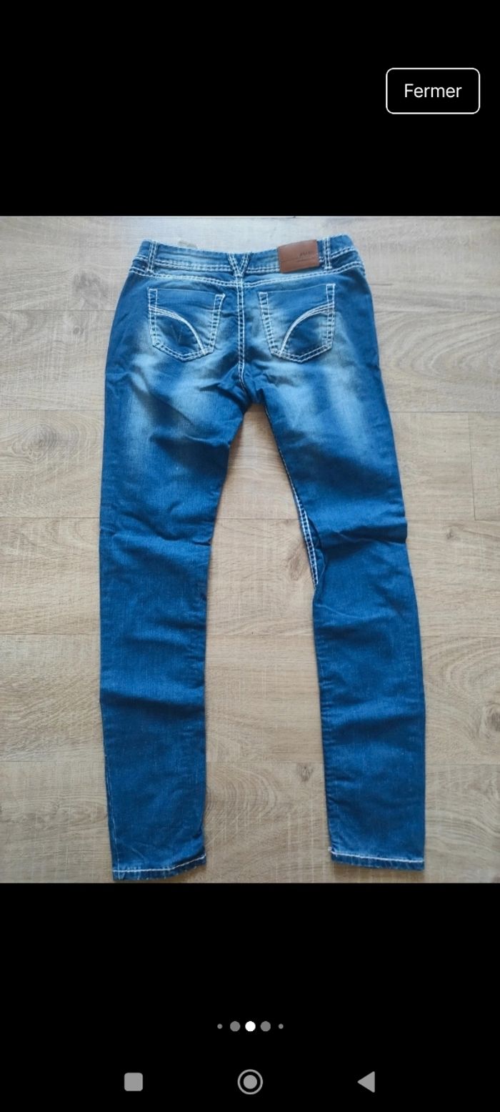 Jean bleu femme Amisu w31  avec surpiqûres blanches - photo numéro 7