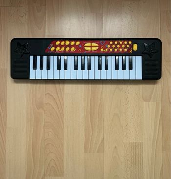 Piano jouet électronique enfant - noir et rouge - partait état