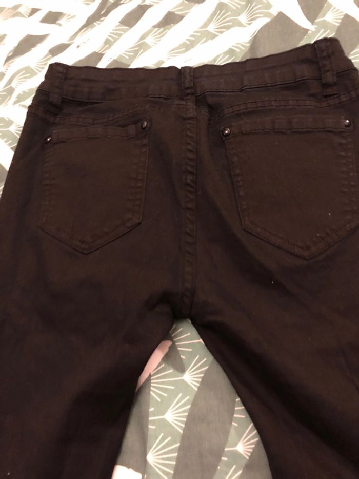 Jeans troué - photo numéro 6