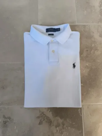 Polo Ralph Lauren homme L blanc logo marine tâche et trou