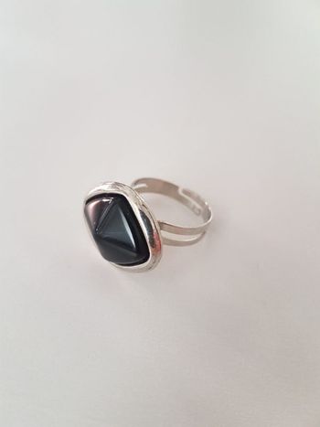 Bague noire et argentée