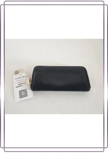 Portefeuille Saint Laurent vintage en cuir, bon état mais quelques  traces d'usures, 20x10cm