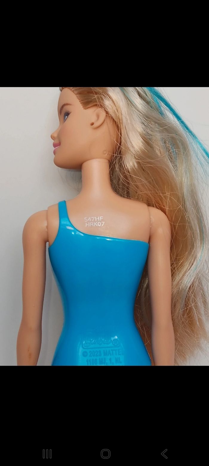 Poupée mattel barbie Color Reveal série 7 bleu hrk07
Poupée et ensemble compris - photo numéro 5
