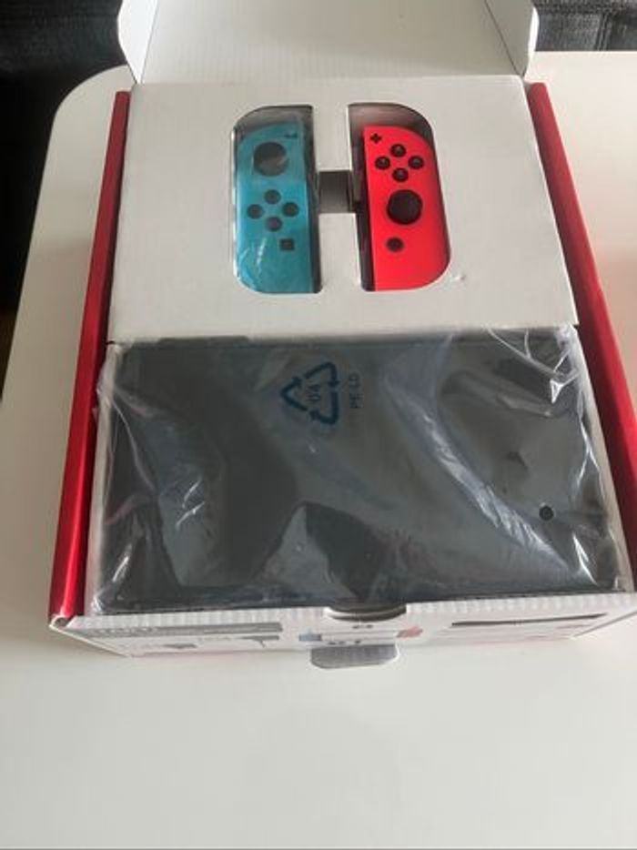 🎮Nintendo Switch Oled - État impeccable + boîte  complète + facture - photo numéro 2
