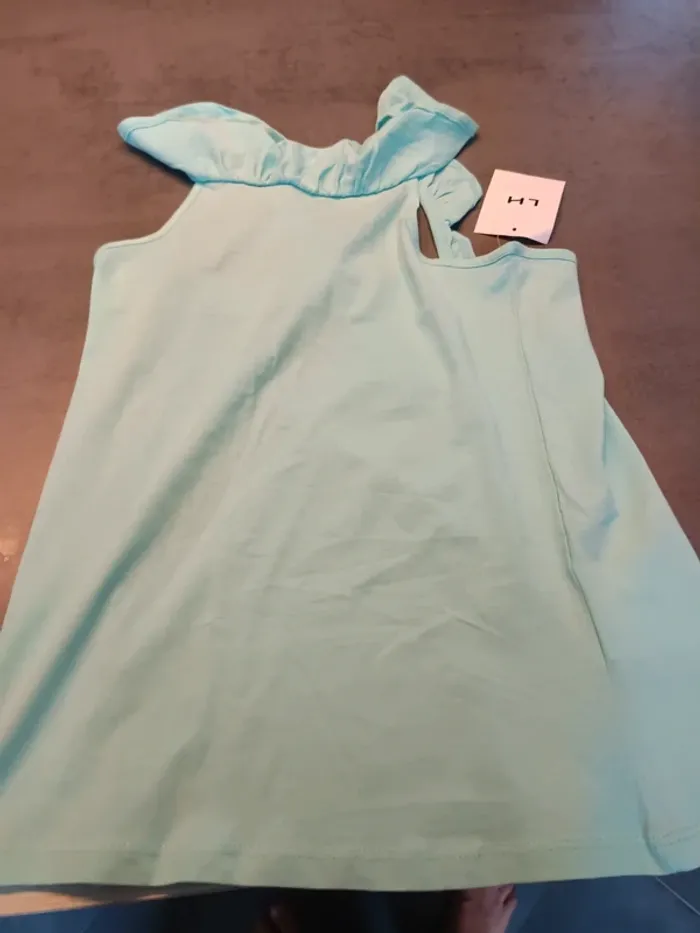 Vends débardeur LH neuf avec étiquette taille 12 ans.