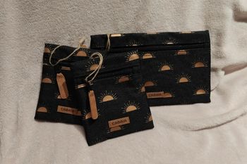 Lot de 3 pochettes cabaïa noires dorés