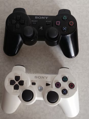 2 Manettes Sans Fil Ps3 Dualshock 3 Noir et Blanc Officielle Sony PlayStation 3