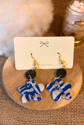 Boucle d'oreille fleur 