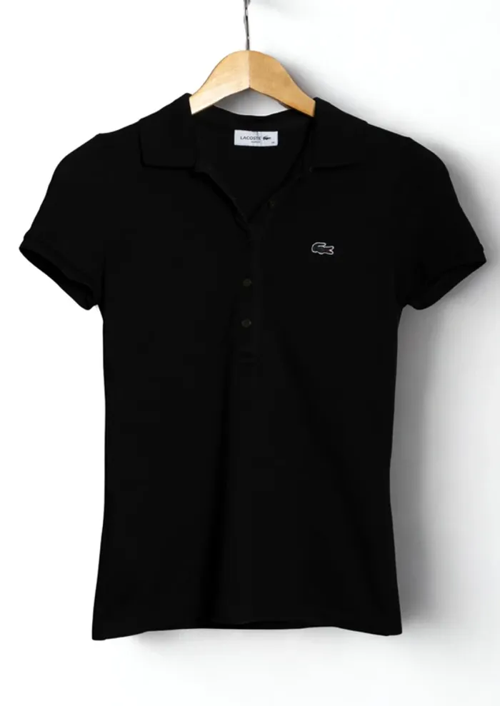 Polo noir manches courtes Lacoste Taille 34