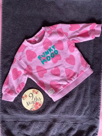 Pull rose motifs cœurs Kiabi 9 mois