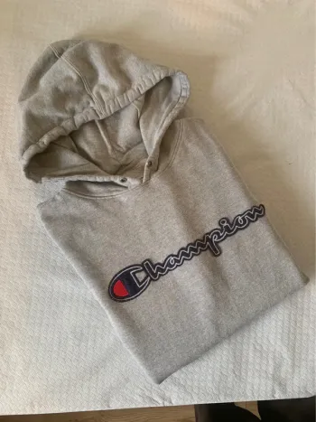 Sweat à capuche Champion Gris - Un classique indémodable