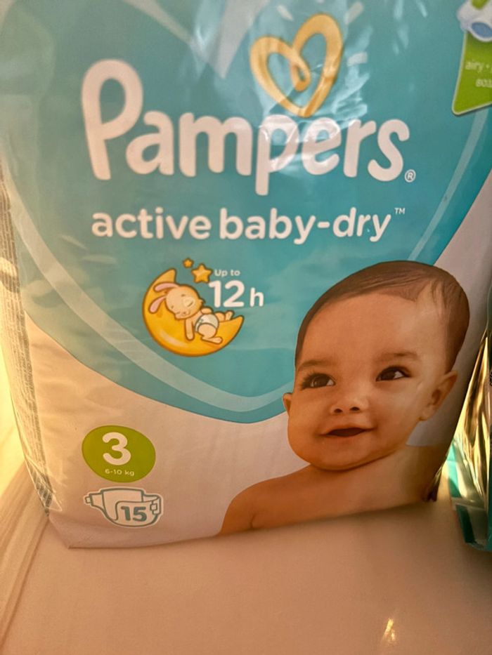 Lot couche Pampers taille 3 - photo numéro 2