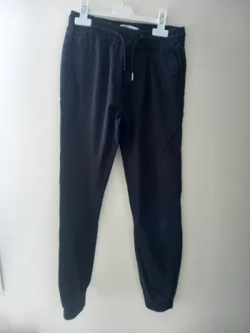 Pantalon jogging noir de la marque " NPO Junior ".