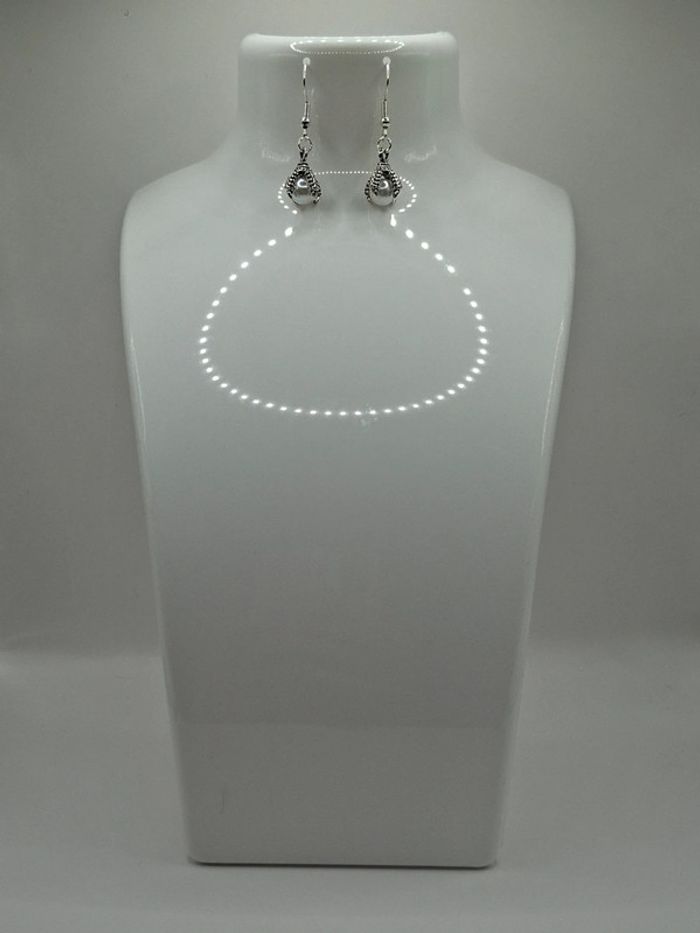 Boucle d'oreille patte de dragon
