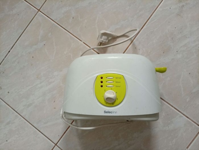 grille pain 🍞 jaune et blanc