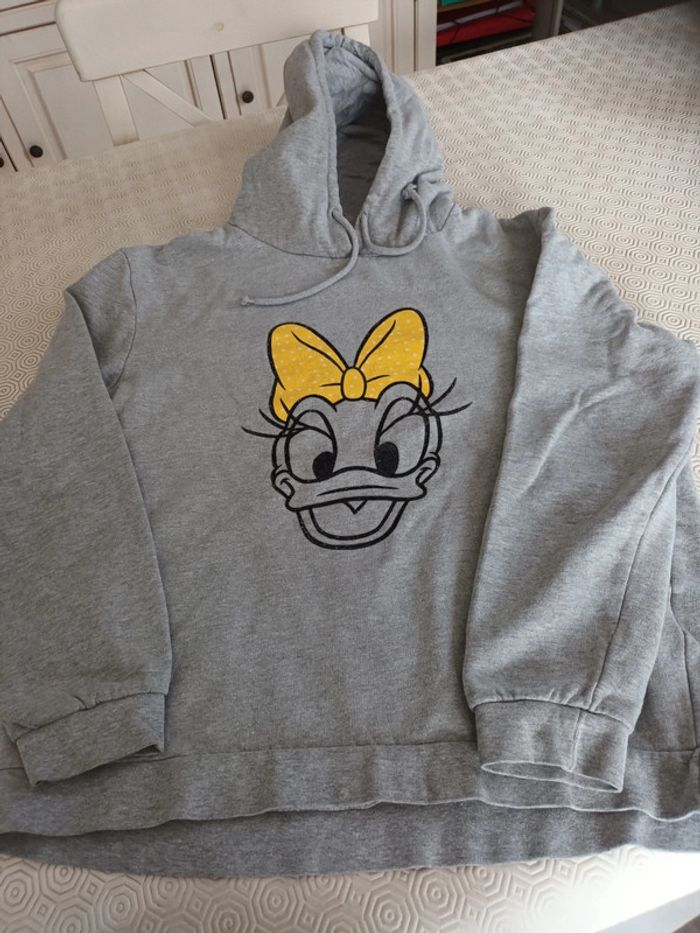 Sweat-shirt  Disney minnie à capuche taille M . Bon état